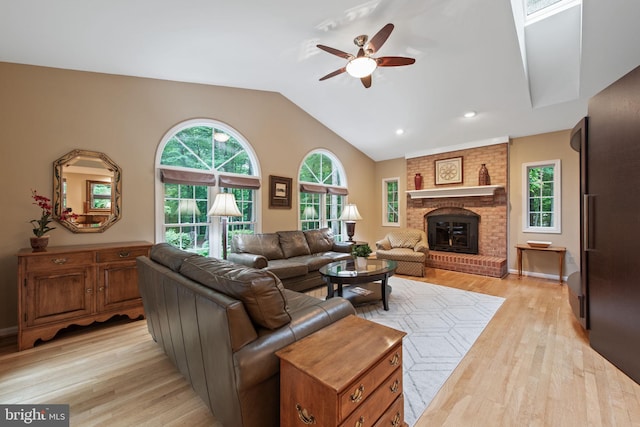 6323 Colchester Rd, Fairfax Station, VA 22039 - living room with a ceiling fan, vaulted ceiling, light wood-style flooring, a fireplace, and recessed lighting