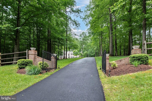 6323 Colchester Rd, Fairfax Station, VA 22039 - view of asphalt driveway featuring a gate