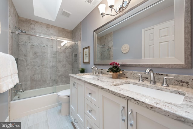 6323 Colchester Rd, Fairfax Station, VA 22039 - full bathroom with toilet, enclosed tub / shower combo, double vanity, and a skylight