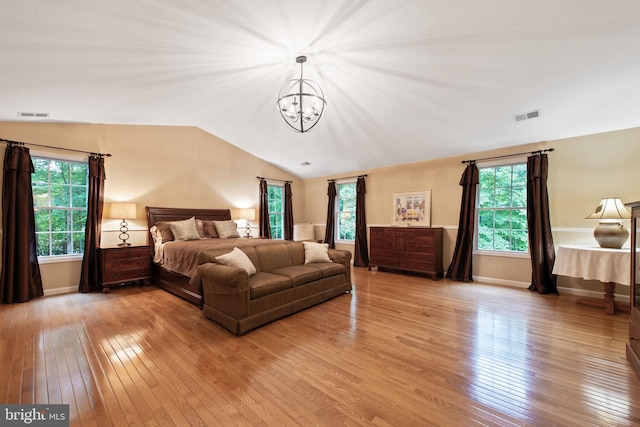 6323 Colchester Rd, Fairfax Station, VA 22039 - bedroom featuring a chandelier, light wood finished floors, multiple windows, and lofted ceiling