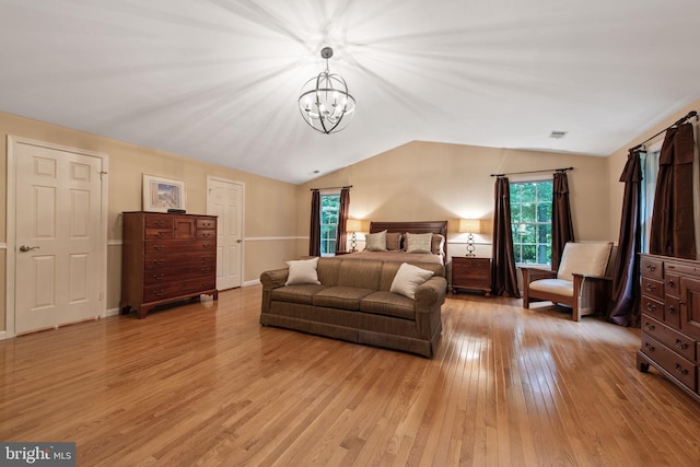 6323 Colchester Rd, Fairfax Station, VA 22039 - bedroom with light wood finished floors, a chandelier, and vaulted ceiling