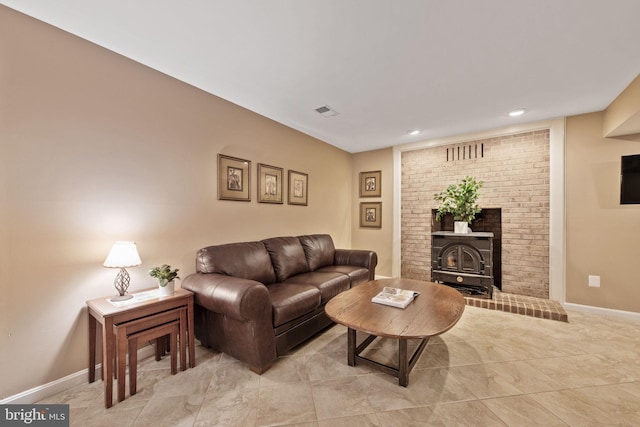 6323 Colchester Rd, Fairfax Station, VA 22039 - living room with a wood stove, baseboards, recessed lighting, and light tile patterned floors