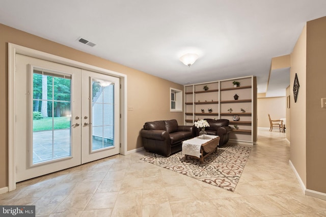 6323 Colchester Rd, Fairfax Station, VA 22039 - living room featuring french doors, baseboards, and light tile patterned floors