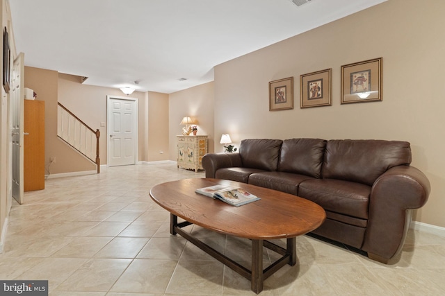 6323 Colchester Rd, Fairfax Station, VA 22039 - living room with stairway, baseboards, and light tile patterned floors