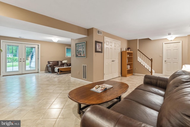 6323 Colchester Rd, Fairfax Station, VA 22039 - living room featuring stairway, french doors, light tile patterned floors, and baseboards