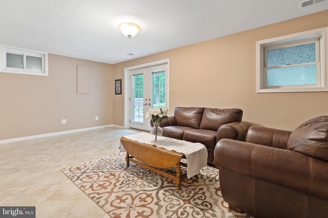 6323 Colchester Rd, Fairfax Station, VA 22039 - living area featuring french doors, baseboards, and light tile patterned flooring