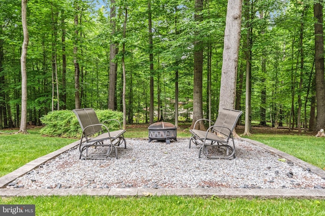 6323 Colchester Rd, Fairfax Station, VA 22039 - view of patio featuring a wooded view