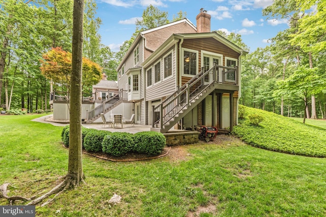 6323 Colchester Rd, Fairfax Station, VA 22039 - back of property featuring stairs, a patio area, a chimney, a deck, and a yard