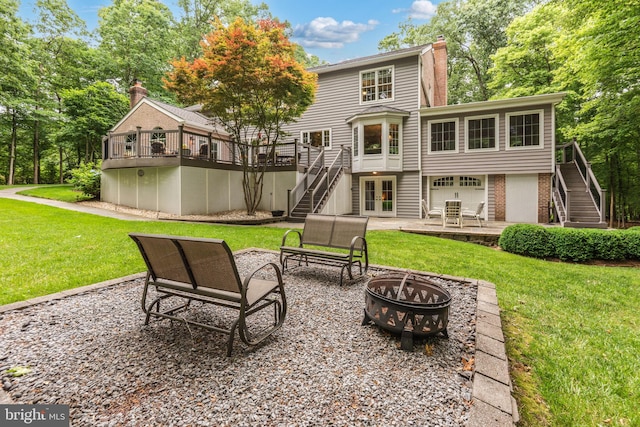 6323 Colchester Rd, Fairfax Station, VA 22039 - back of house featuring stairway, an outdoor fire pit, a deck, and a chimney