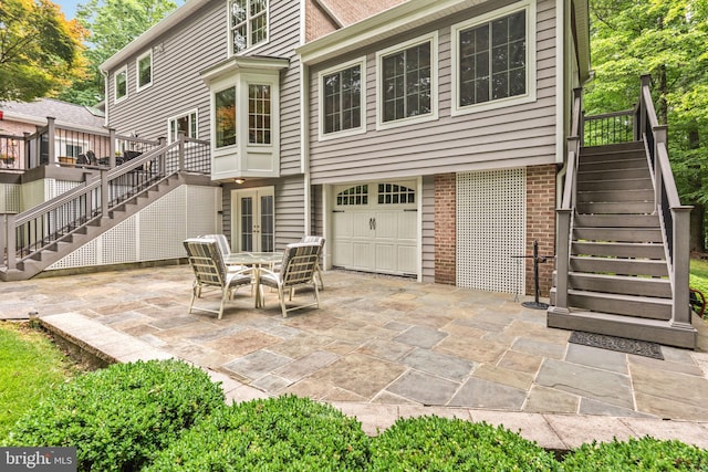 6323 Colchester Rd, Fairfax Station, VA 22039 - view of patio / terrace featuring stairs, a garage, and a wooden deck