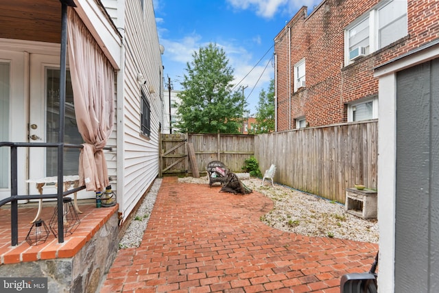 1420 V St SE, Washington, DC 20020 - fenced backyard with a patio area and a gate