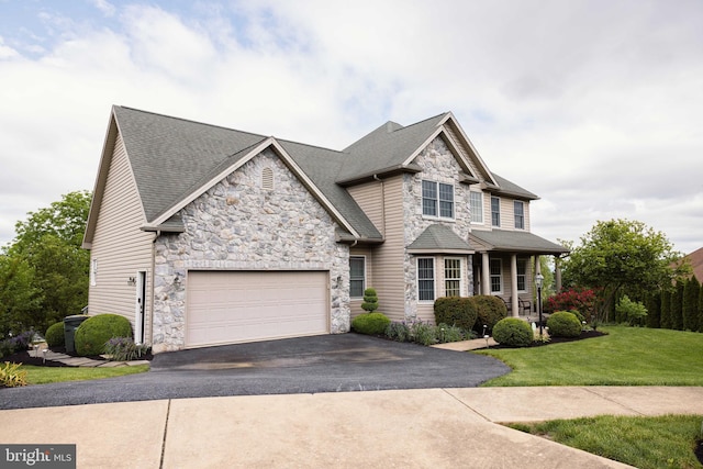 5110 Maple Leaf Ct, Mechanicsburg, PA 17055 - craftsman inspired home with stone siding, asphalt driveway, a garage, a front yard, and a porch