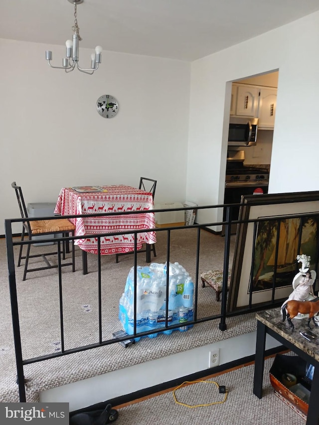 9900 Georgia Ave Unit 27-709, Silver Spring, MD 20902 - dining room featuring a chandelier