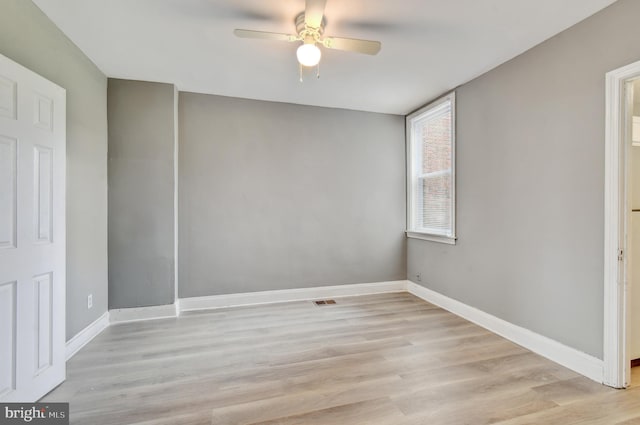 2726 E Preston St, Baltimore, MD 21213 - unfurnished bedroom featuring light wood-style flooring, baseboards, and ceiling fan