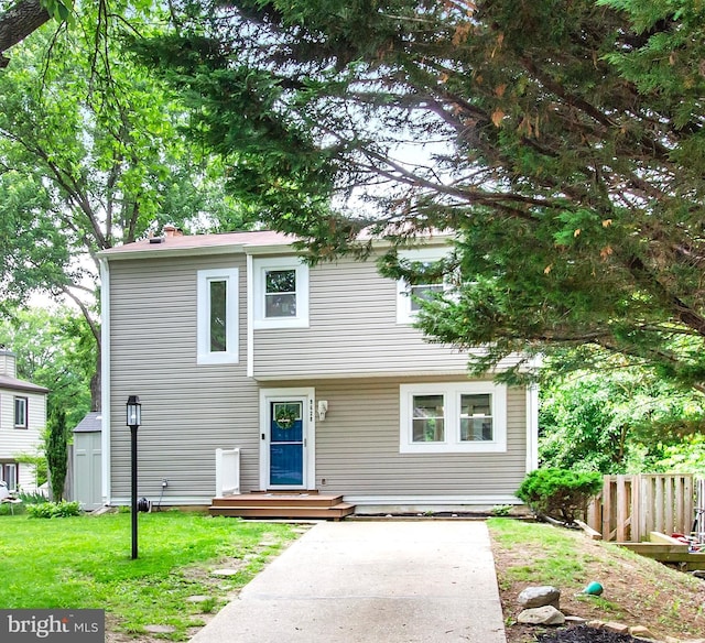9628 Rocksparkle Row, Columbia, MD 21045 - view of front of home with a chimney, a patio, and a shed