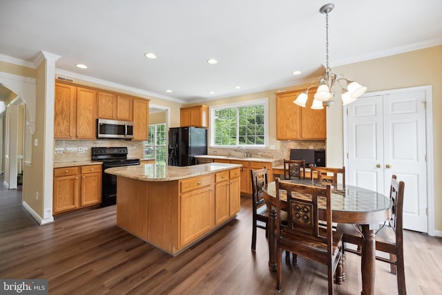 8456 Summer Breeze Pl, Manassas, VA 20112 - kitchen featuring black appliances, a sink, dark wood-type flooring, a chandelier, and decorative backsplash