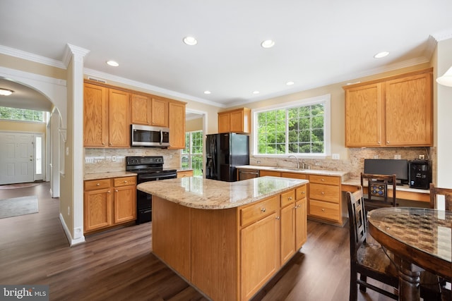 8456 Summer Breeze Pl, Manassas, VA 20112 - kitchen with black appliances, a sink, dark wood-style flooring, a kitchen island, and decorative backsplash
