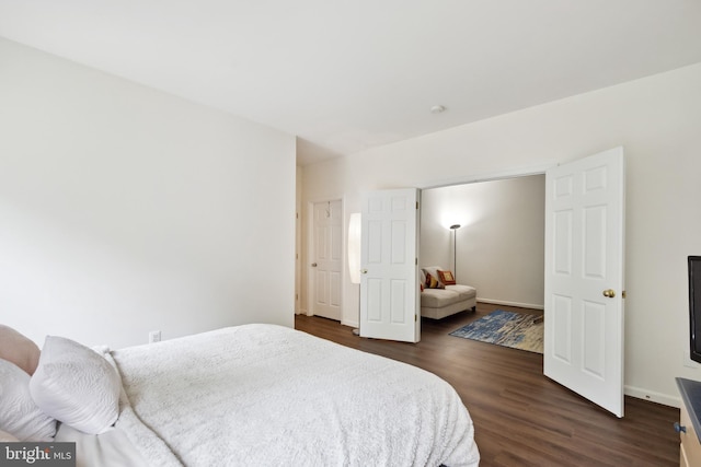 8456 Summer Breeze Pl, Manassas, VA 20112 - bedroom with dark wood-style floors and baseboards
