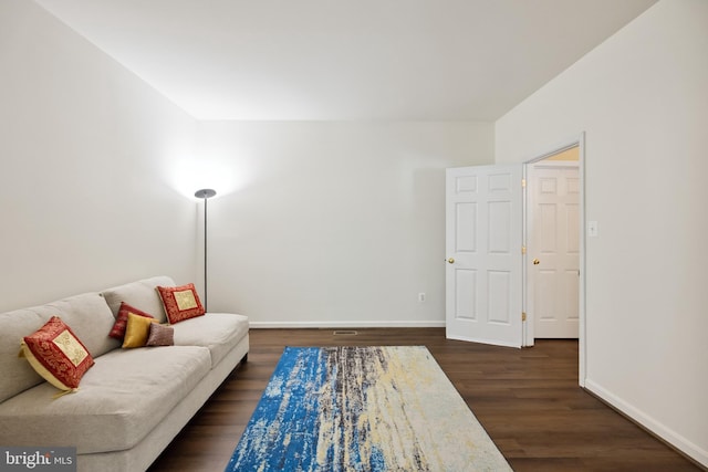 8456 Summer Breeze Pl, Manassas, VA 20112 - living area featuring dark wood finished floors and baseboards