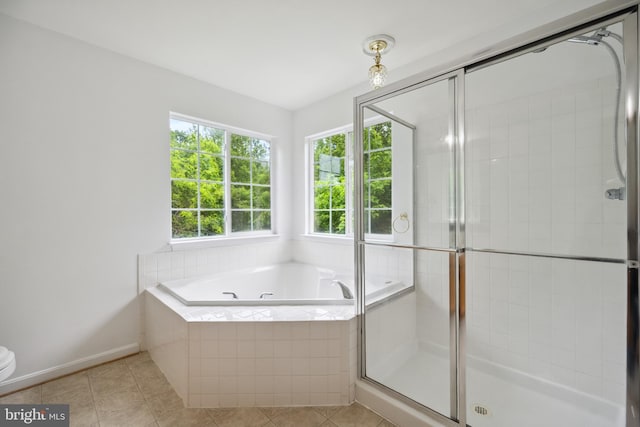 8456 Summer Breeze Pl, Manassas, VA 20112 - bathroom featuring a stall shower, a bath, tile patterned floors, and toilet