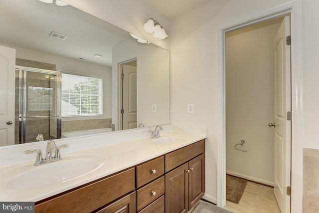 22672 Flowing Spring Sq, Brambleton, VA 20148 - full bathroom with double vanity, a shower stall, and a bath
