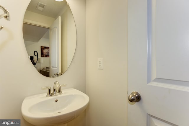 22672 Flowing Spring Sq, Brambleton, VA 20148 - bathroom featuring a sink