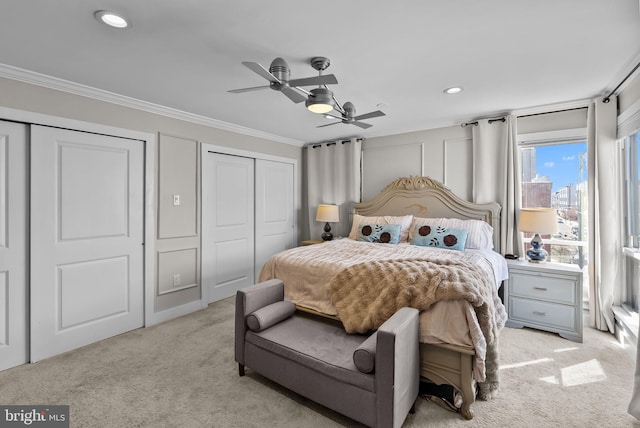 1001 S Chadwick St, Philadelphia, PA 19146 - bedroom featuring light carpet, ornamental molding, recessed lighting, ceiling fan, and multiple closets