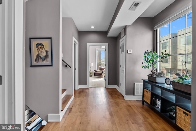 1001 S Chadwick St, Philadelphia, PA 19146 - entrance foyer with baseboards, plenty of natural light, wood finished floors, and recessed lighting