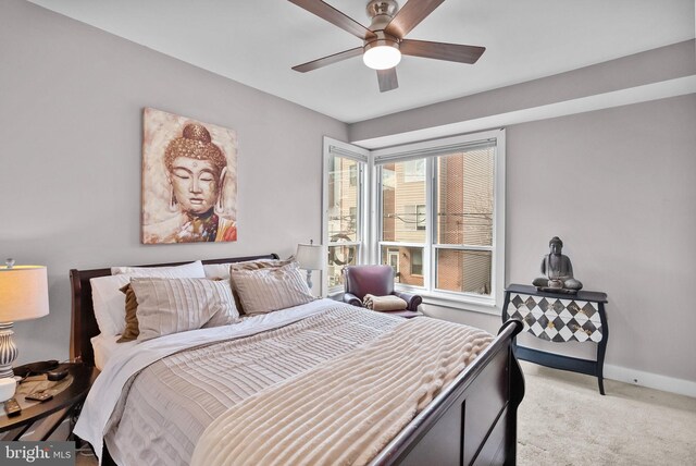1001 S Chadwick St, Philadelphia, PA 19146 - bedroom with light carpet, baseboards, and ceiling fan