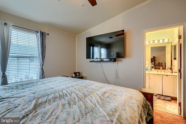 644 Luthardt Rd, Middle River, MD 21220 - carpeted bedroom with vaulted ceiling, ensuite bathroom, and a sink