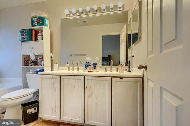 644 Luthardt Rd, Middle River, MD 21220 - bathroom featuring toilet, double vanity, and a bath