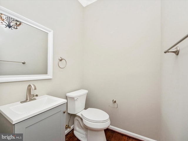11937 Saint Francis Way, Bowie, MD 20721 - half bath featuring wood finished floors, vanity, baseboards, and toilet