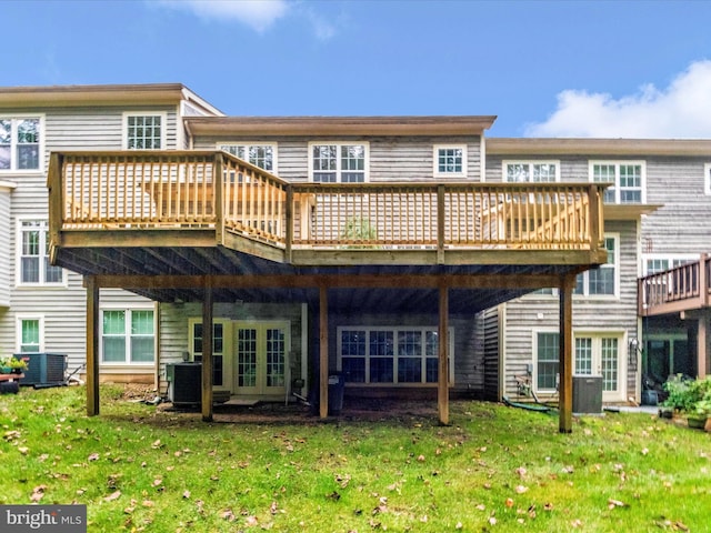 11937 Saint Francis Way, Bowie, MD 20721 - back of property featuring a deck, a lawn, and central AC unit