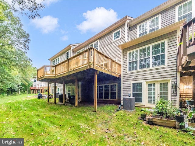 11937 Saint Francis Way, Bowie, MD 20721 - rear view of house featuring central AC unit, a yard, and a deck