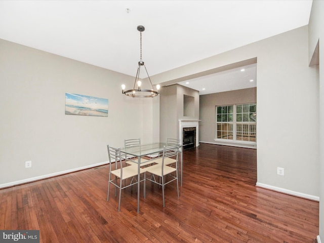 11937 Saint Francis Way, Bowie, MD 20721 - dining room featuring wood finished floors, a chandelier, baseboards, a high end fireplace, and recessed lighting