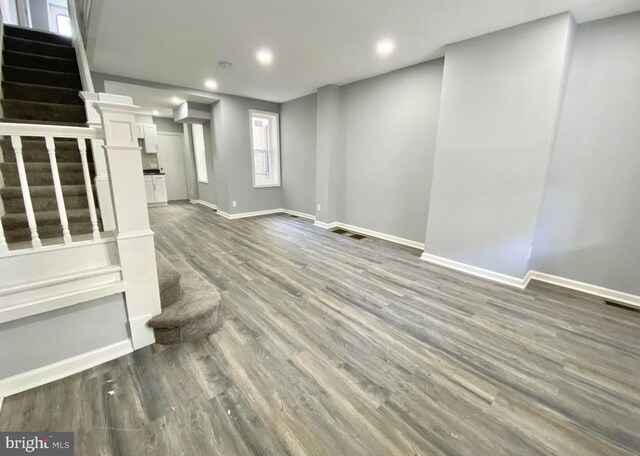 2922 W Norris St, Philadelphia, PA 19121 - unfurnished living room featuring stairway, recessed lighting, wood finished floors, and baseboards
