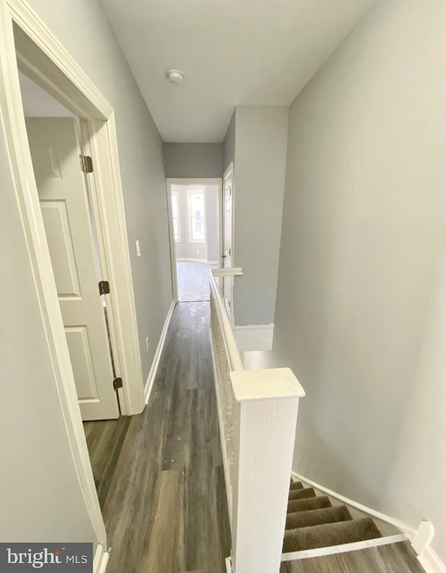 2922 W Norris St, Philadelphia, PA 19121 - hall with an upstairs landing, dark wood-type flooring, and baseboards