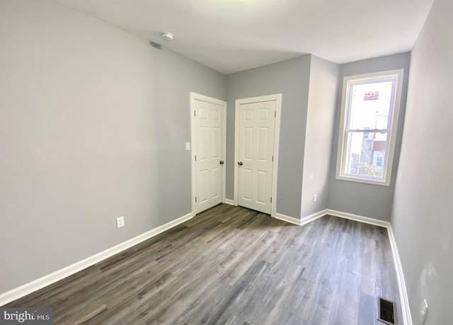 2922 W Norris St, Philadelphia, PA 19121 - unfurnished room featuring dark wood finished floors and baseboards