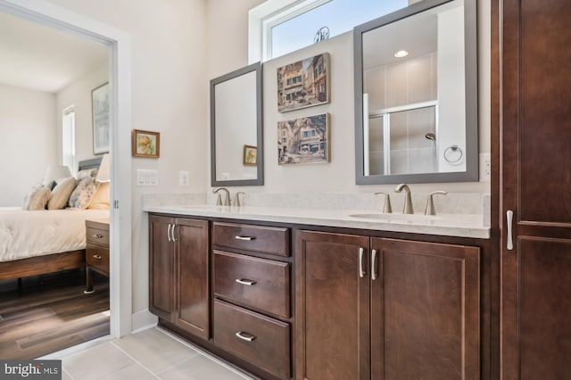 298 Rustic Wood Dr, Gettysburg, PA 17325 - ensuite bathroom with a shower stall, double vanity, and tile patterned flooring