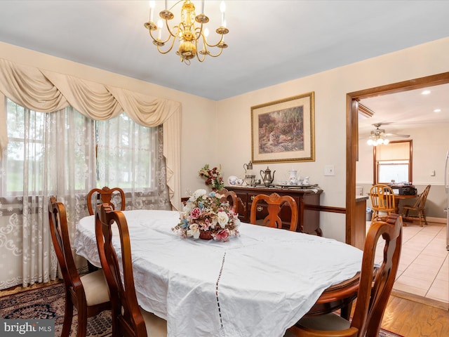 1112 Stromko Dr, Fallston, MD 21047 - dining space with a chandelier, wood finished floors, and baseboards