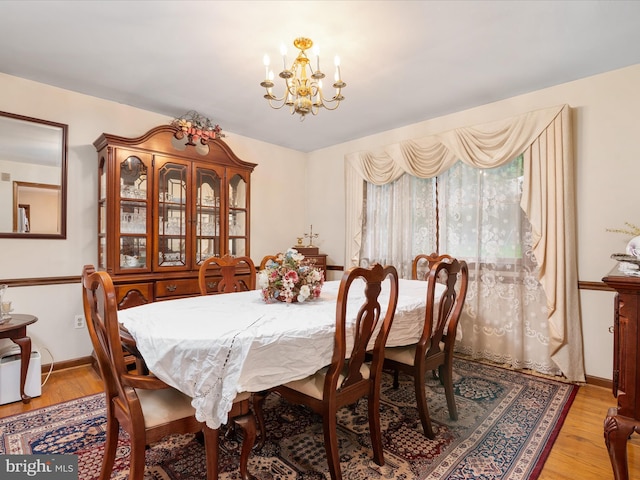 1112 Stromko Dr, Fallston, MD 21047 - dining room featuring a chandelier and light wood finished floors