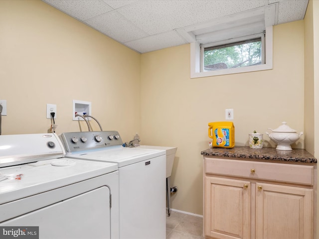 1112 Stromko Dr, Fallston, MD 21047 - laundry room with washing machine and dryer, cabinet space, light tile patterned floors, and baseboards