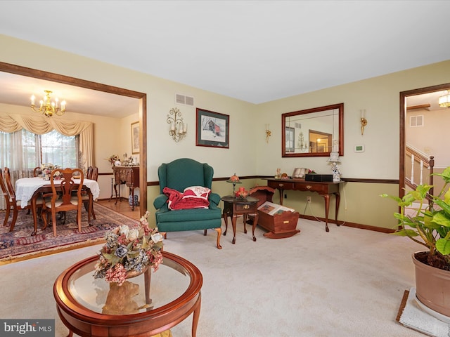 1112 Stromko Dr, Fallston, MD 21047 - carpeted living area with a chandelier, stairway, and baseboards