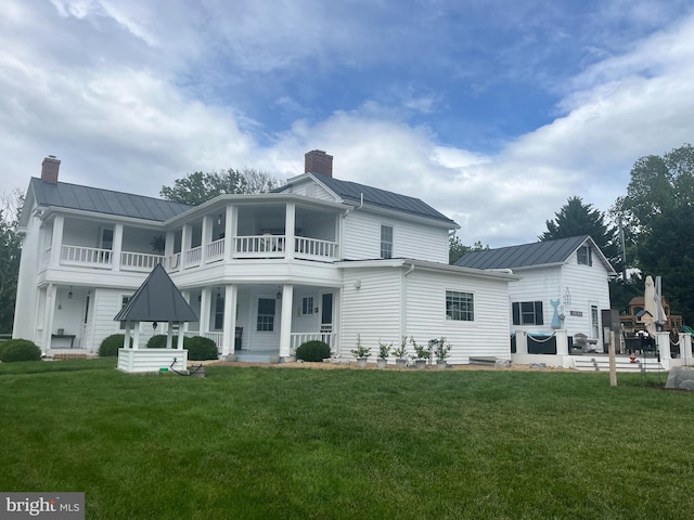 27986 Old Valley Pike, Toms Brook, VA 22660 - rear view of property featuring a balcony, a chimney, and a standing seam roof
