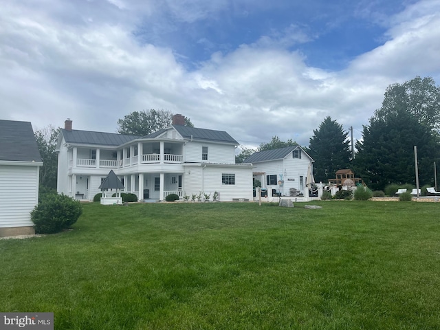 27986 Old Valley Pike, Toms Brook, VA 22660 - back of property with a balcony, a chimney, and a lawn