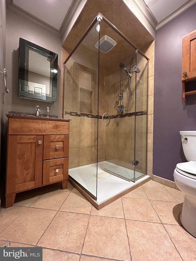 1821 Driver Ave, Lancaster, PA 17602 - bathroom with toilet, vanity, ornamental molding, a stall shower, and tile patterned floors
