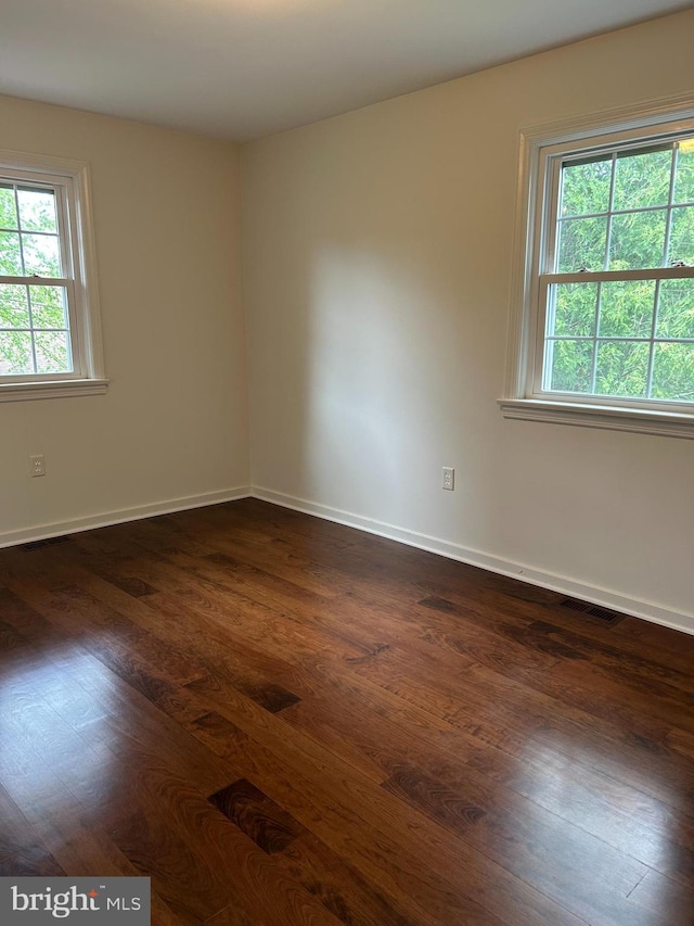 1821 Driver Ave, Lancaster, PA 17602 - unfurnished room featuring dark wood-style floors and baseboards