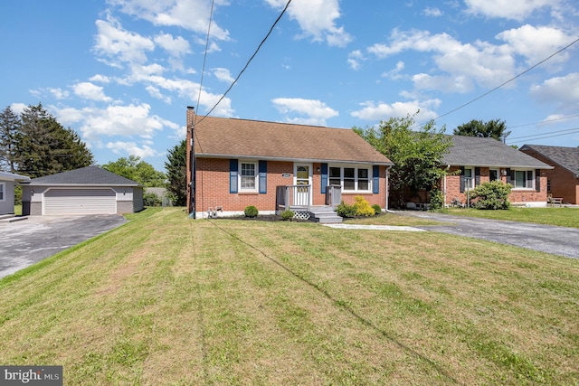 2269 Locust Ln, York, PA 17408 - view of front facade with a detached garage, brick siding, a chimney, and a front yard