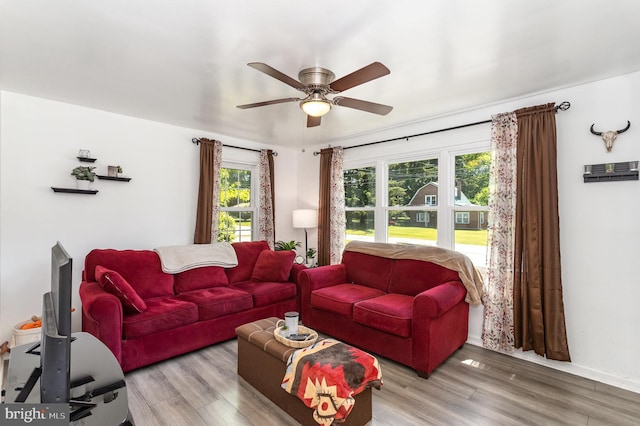 2269 Locust Ln, York, PA 17408 - living room featuring a ceiling fan, light wood-style floors, and baseboards