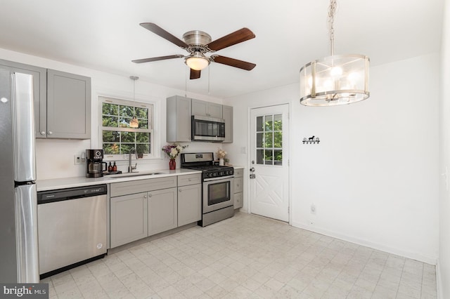 2269 Locust Ln, York, PA 17408 - kitchen with appliances with stainless steel finishes, a sink, and gray cabinetry
